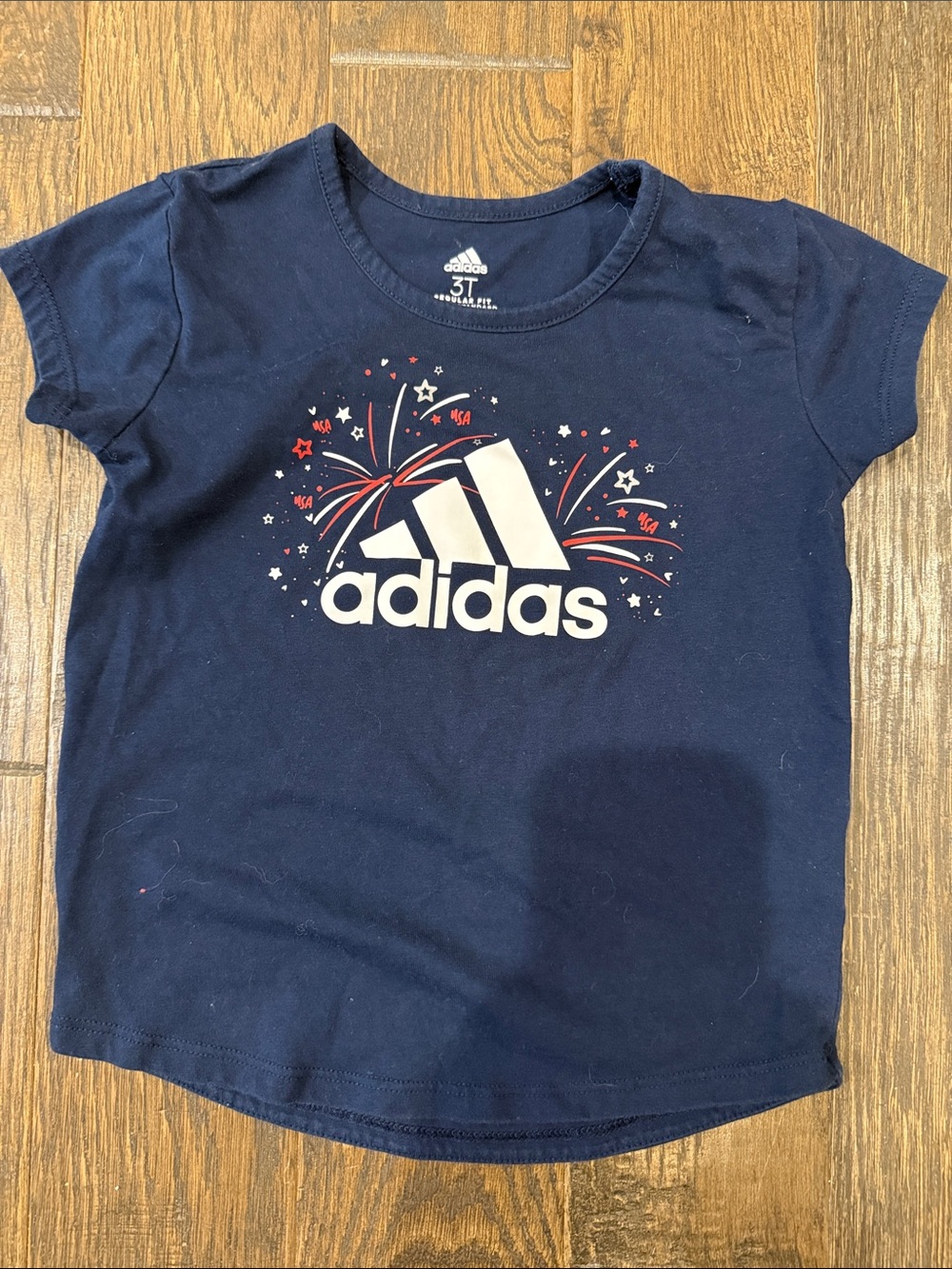adidas Navy Short Sleeve Tee with White Logo and Red Firework Accents